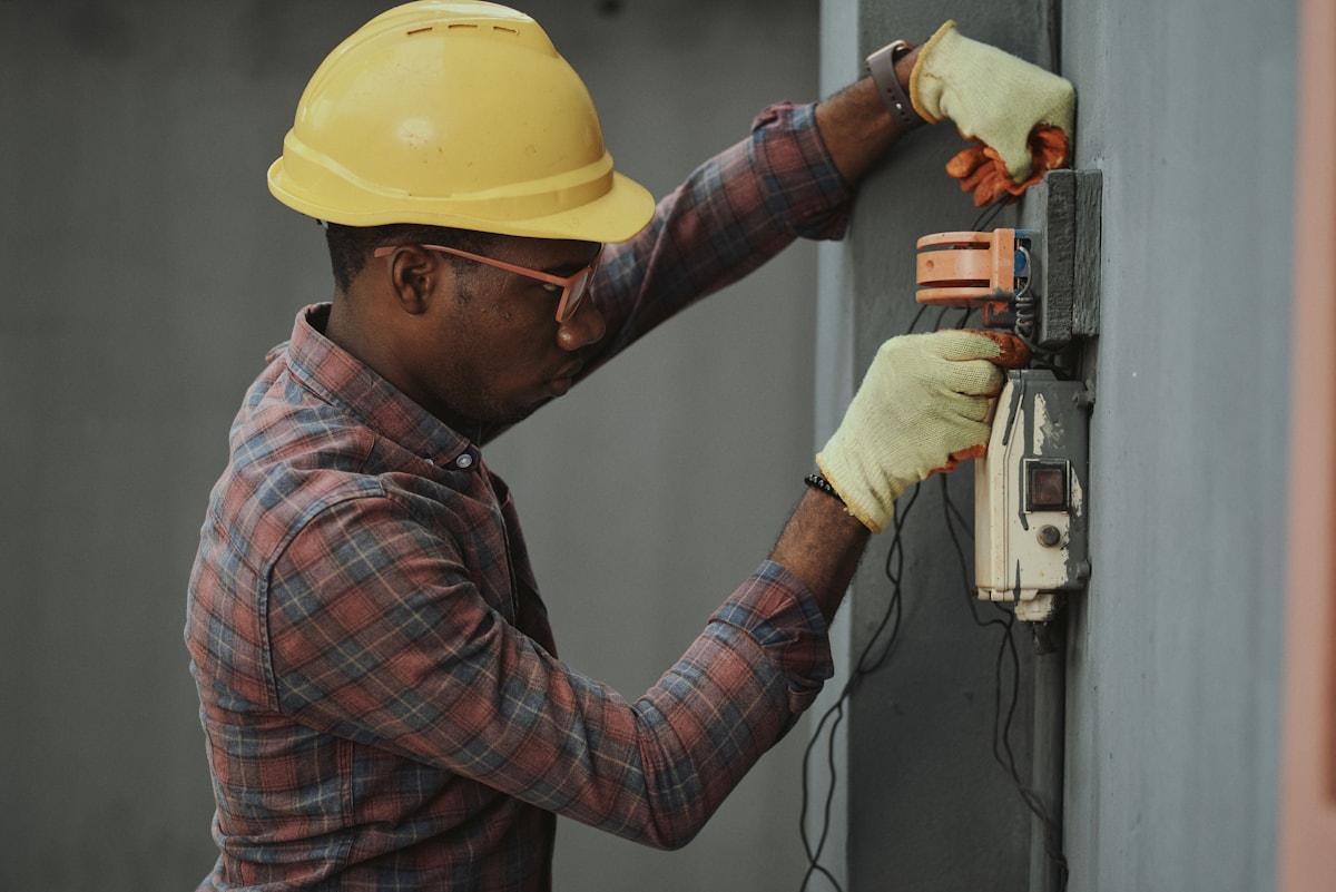Service technician working on building equipment