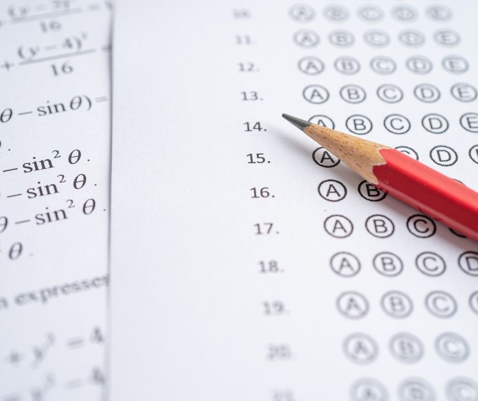 A math test with equations on the left and a multiple-choice answer sheet on the right. A red pencil points to question 15, symbolizing business efficiency in action, much like a VA agency streamlining remote work tasks.